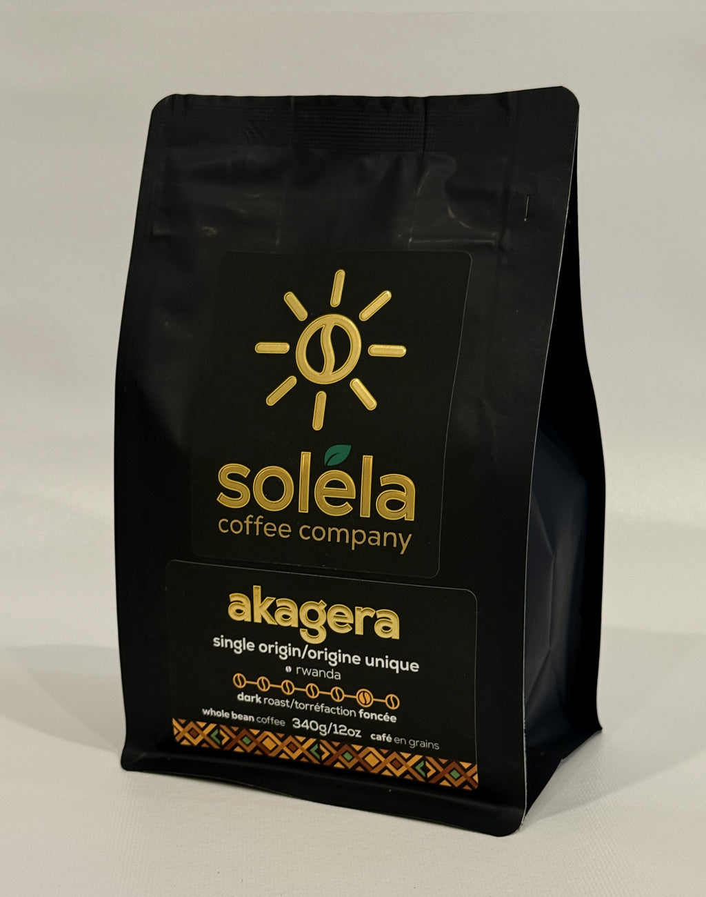 Black coffee bag with Soleéla Coffee Company logo and 'akagera' text on a light gray background